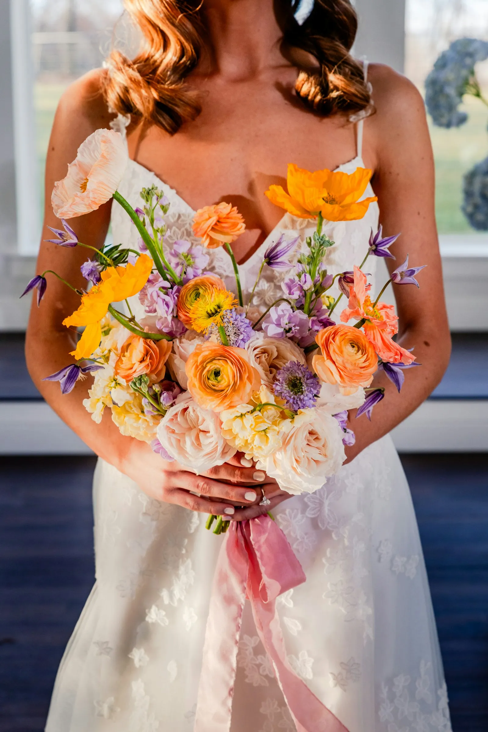 A bouquet of poppies and ranunculus